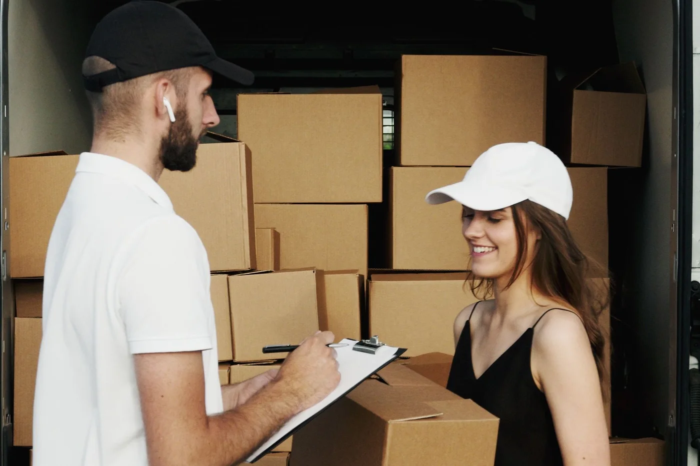 A day of orders being handed over at a delivery van